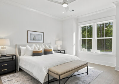 Interior staged bedroom of 1167 Guerins Bridge in Awendaw, SC by Grantham Homes