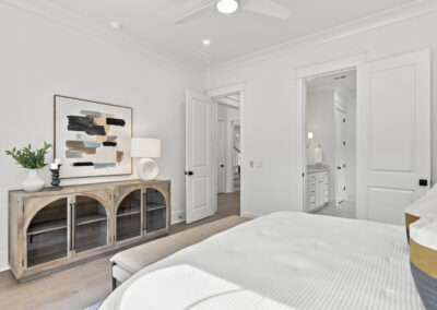 Interior staged bedroom of 1167 Guerins Bridge in Awendaw, SC by Grantham Homes