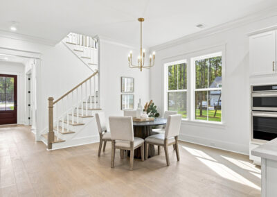 Interior staged dining room of 1167 Guerins Bridge in Awendaw, SC by Grantham Homes
