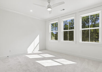 Interior second story bedroom of 1167 Guerins Bridge in Awendaw, SC by Grantham Homes