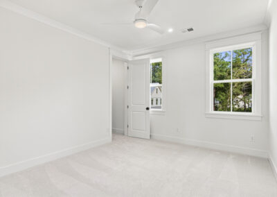 Interior second story bedroom of 1167 Guerins Bridge in Awendaw, SC by Grantham Homes